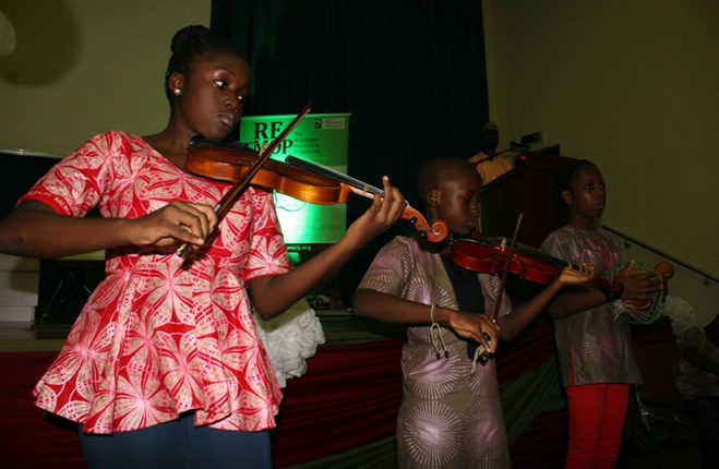 Julie Darling Children Orchestra, opening the 2017 Wole Soyinka Media Lecture Series event in Abuja with a rendition of the National Anthem