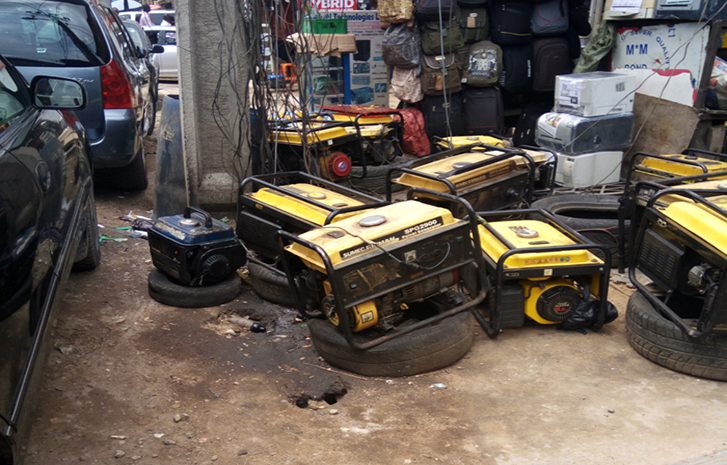 Shop owners use generators to power their shops at Computer Village, Ikeja, Lagos.