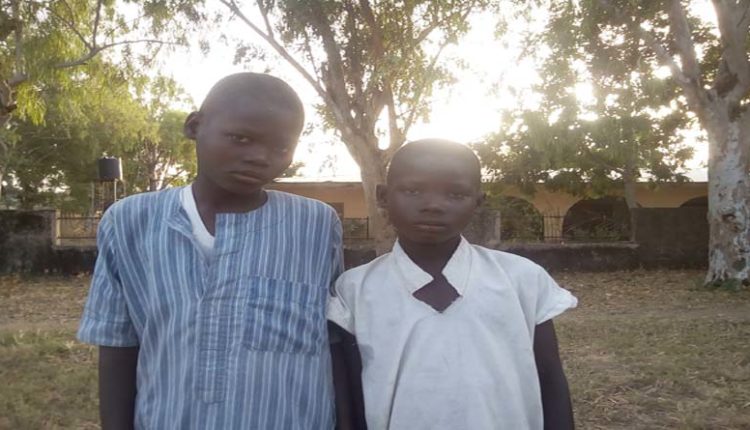 Thirteen year old Sadiq (left) and eleven year old Nabil (right), his younger sibling