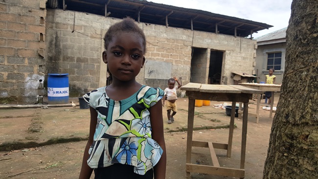 Six-year-old Beatrice Ogbor and her sibling Eliesar (behind) who has never witnessed electricity since birth Photo Credit: Olugbenga Adanikin, The ICIR
